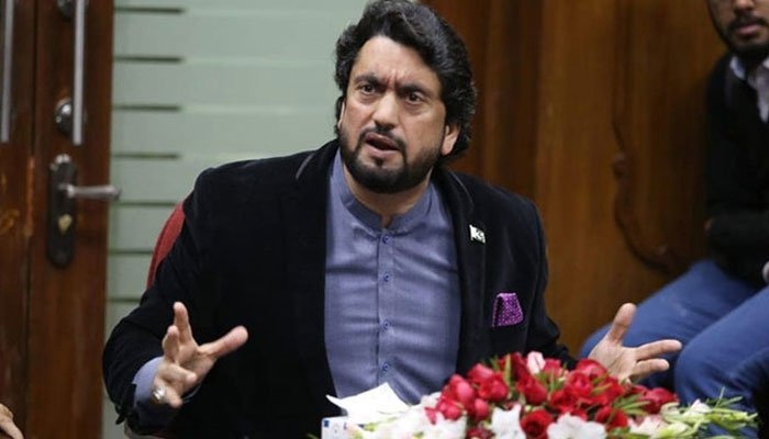 PTI leader Shehryar Afridi gestures while he speaks at a press conference. Photo: File
