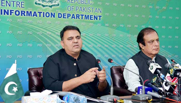 Federal Minister for Information and Broadcasting Fawad Chaudhry (L) and Minister for Science and Technology Shibli Faraz, addressing a press conference at Press Information Department, Islamabad, on September 19, 2021. — PID