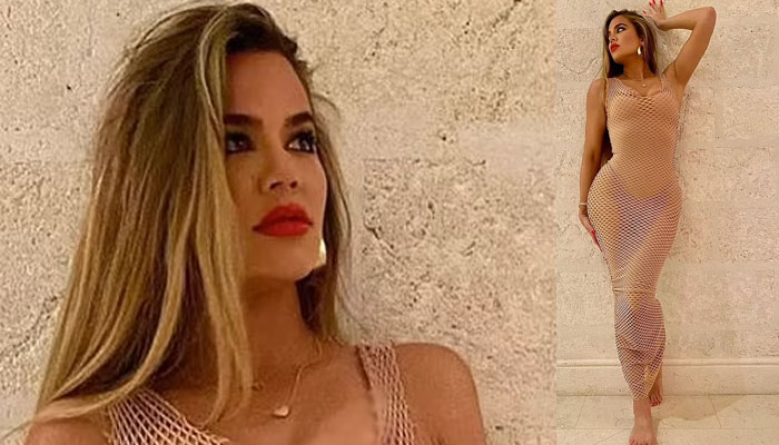 Khloe Kardashian turns the heat up as she rocks see-through net dress