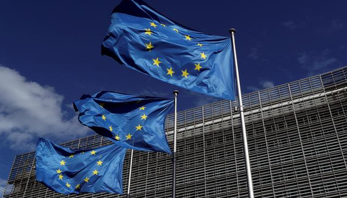 European Union flags flutter outside the European Commission headquarters in Brussels, Belgium August 21, 2020. — Reuters/File