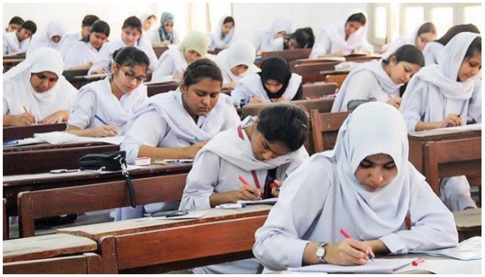 Female students in an examination hall. Photo — Online