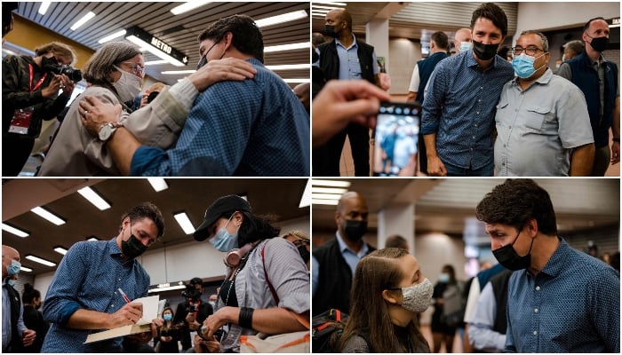 Canadian Prime Minister Justin Trudeau is seen during a meet and greet with constituents at the Jarry Metro station in Montreal, Quebec early on the morning of September 21, 2021. — AFP