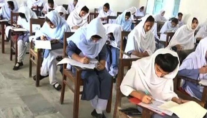 Students in an examination hall.