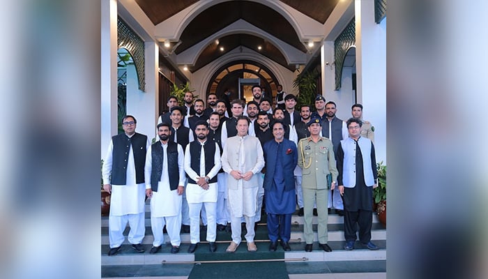 Pakistani T20 World Cup Squad takes a group photo with Prime Minister Imran Khan (centre) after a meeting at PM House, in Islamabad, on September 22, 2021. — Instagram