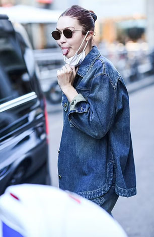Gigi Hadid stuns as she walks in a double-denim ensemble during Milan Fashion Week