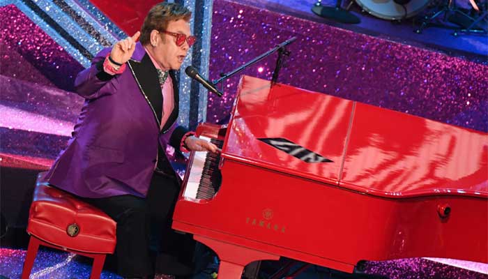 Elton John performs ‘Tiny Dancer’ as he kicks off world-spanning gigs for climate, vaccines