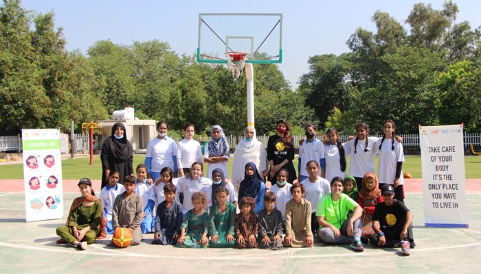 A group picture of children at a three-day basketball training camp. —Photo by author