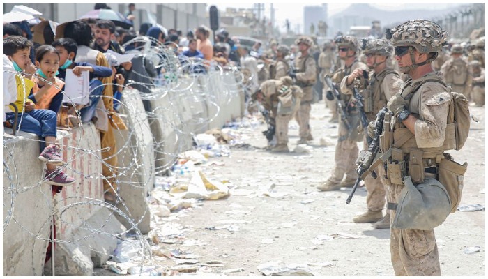 US Marines provide assistance during an evacuation at Hamid Karzai International Airport, in Kabul, Afghanistan, August 20, 2021. — Reuters