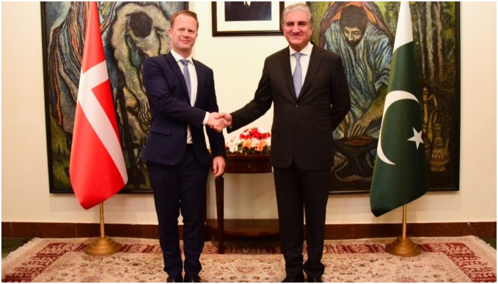 FM Qureshi shakes hands with Danish counterpart. Photo: APP