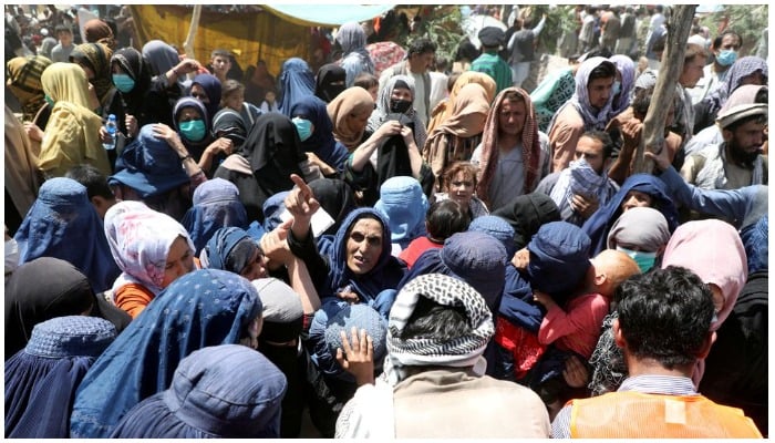 Internally displaced families from northern provinces, who fled from their homes due the fighting between Taliban and Afghan security forces, take shelter in a public park in Kabul, Afghanistan, August 10, 2021.REUTERS