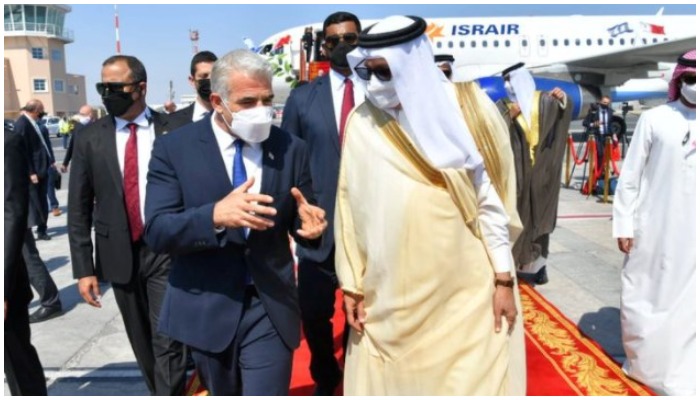 Israeli Foreign Minister Yair Lapid is received by Bahrains Foreign Minister Abdullatif Al-Zayani upon his arrival at Bahrain International Airport in Muharraq, Bahrain, on September 30, 2021. Israel Ministry of Foreign Affairs/Handout via REUTER
