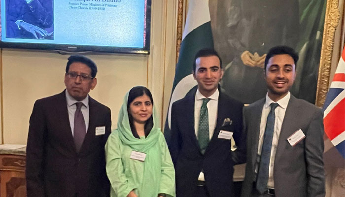 A group picture of Malala Yousufzai with representatives from Oxford University. — Photo by Talha Jamal Pirzada.