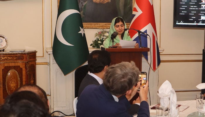 Malala Yousafzai speaking to the people present at the launch ceremony of the Oxford Pakistan Programme. — Photo by Talha Jamal Pirzada.