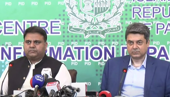 Minister for Information and Broadcasting Fawad Chaudhry (L) and  Minister for Law Farogh Naseem addressing a press conference in Islamabad, on October 6, 2021. — YouTube/Hum News