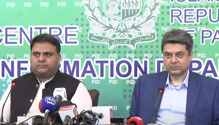 Minister for Information and Broadcasting Fawad Chaudhry (L) and Minister for Law Farogh Naseem addressing a press conference in Islamabad, on October 6, 2021. — YouTube/Hum News