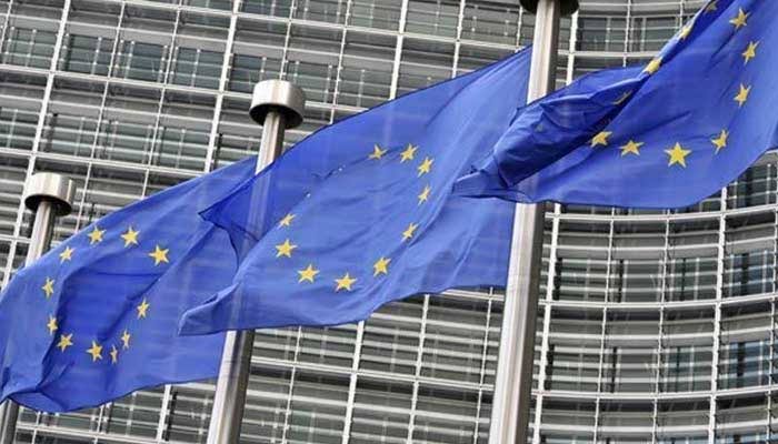 European Union flags fly outside the European Commission building, in Brussels, in this AFP file photo.