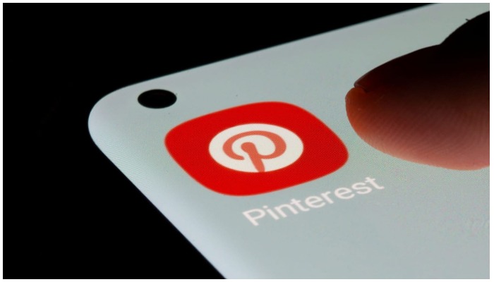 Pinterest app is seen on a smartphone in this illustration taken, July 13, 2021. REUTERS