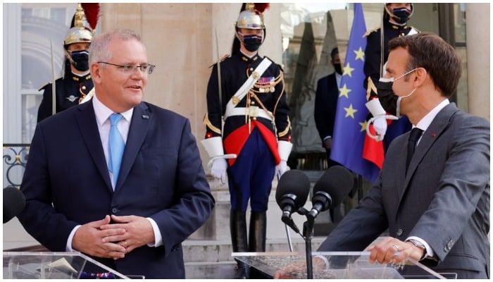 French President Emmanuel Macron and Australian Prime Minister Scott Morrison hold a news conference as they meet at the Elysee Palace in Paris, France, on June 15, 2021. Photo: Reuters/ Pascal Rossignol.