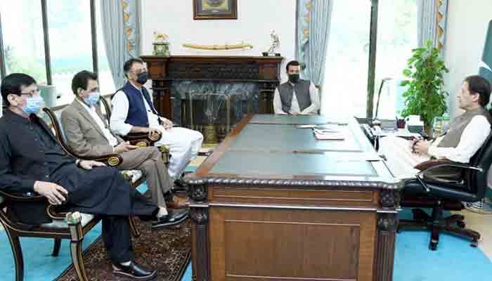 Prime Minister Imran Khan in meeting with MQM-P lawmakers. Photo Radio Pakistan