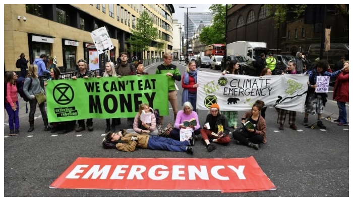 Climate change activists block traffic in the Londons financial district during environmental protests by the Extinction Rebellion group in London on April 25th, 2019. Photo: AFP