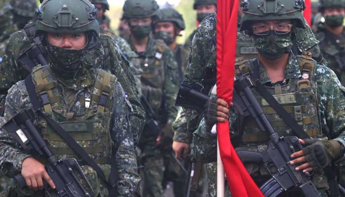 Taiwan soldiers march to position during an anti-invasion drill on the beach during the annual Han Kuang military drill last month. Photo: Reuters