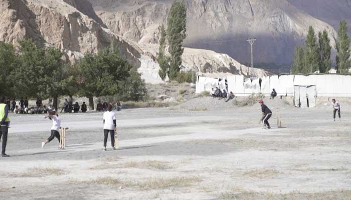 An ongoing cricket match during the tournament in Gilgit.