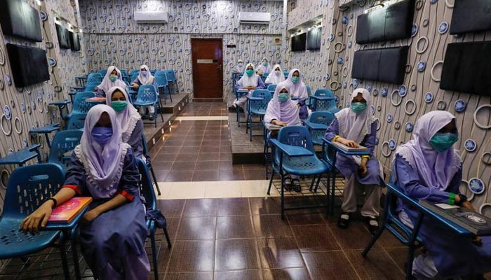 Girls can be sitting in a classroom wearing masks and practicing social distancing. — Reuters/File