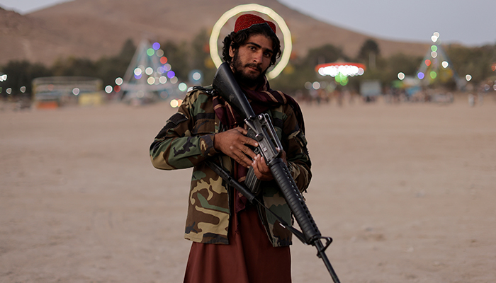 Taliban fighter, Mostashhed from Wardak province, looks on as he visits Kabul for the first time as hundreds of Taliban fighters take a day off to visit the amusement park at Kabuls Qargha reservoir, at the outskirts of Kabul, Afghanistan October 8, 2021. Picture taken October 8, 2021. — Reuters