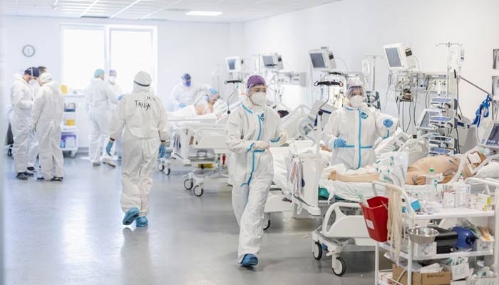 Medical workers treat patients suffering from the coronavirus disease (COVID-19) at Batajnica COVID-19 hospital in Belgrade, Serbia, October 4, 2021. — REUTERS