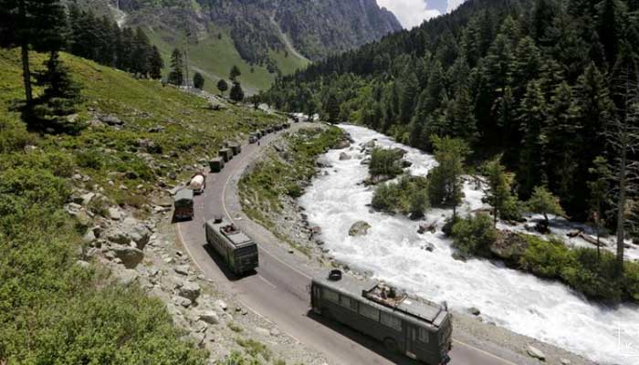An Indian Army convoy moves along a highway leading to Ladakh, at Gagangeer in Kashmirs Ganderbal district on June 18, 2020. REUTERS.