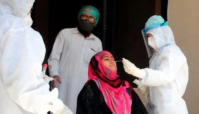 A woman gets tested for coronavirus. Photo: Geo.tv/file