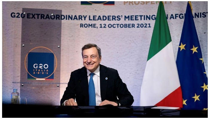 Italian Prime Minister Mario Draghi attends virtually an extraordinary G20 leaders meeting on Afghanistan, in Rome, Italy, October 12, 2021. Filippo Attili/Palazzo Chigi Press Office/Handout via REUTERS