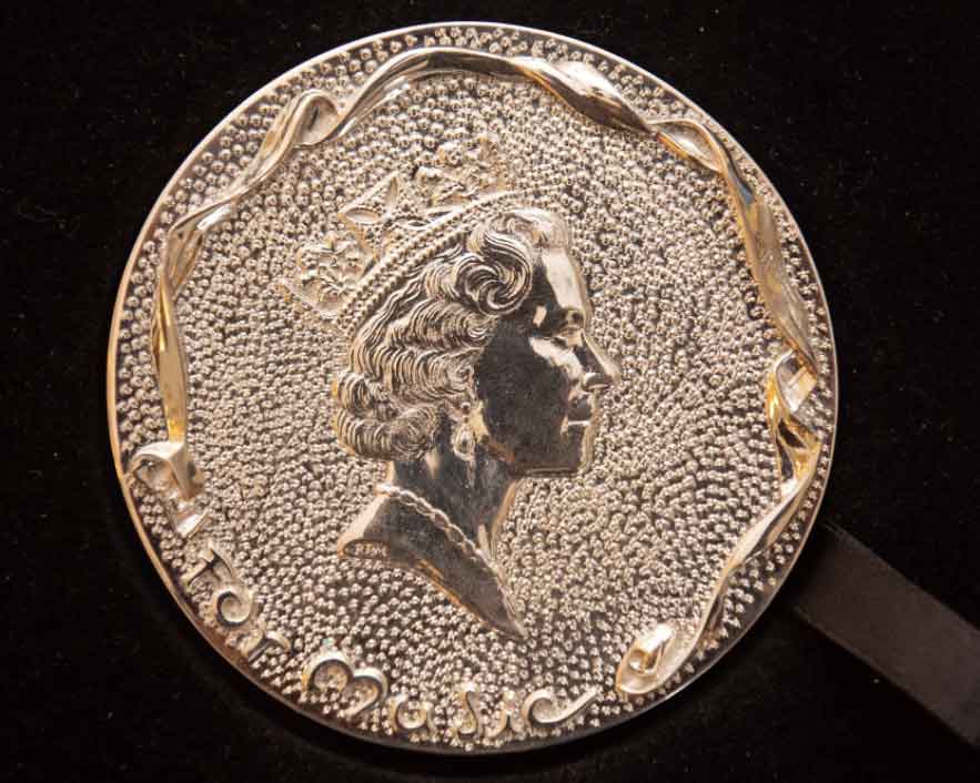 Pianist Dame Imogen Cooper receives Medal for Music from Queen Elizabeth