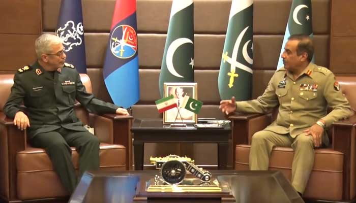 Irans Chief of General Staff of Armed Forces Maj Gen Mohammad Bagheri (L) and Chairman Joint Chiefs of Staff Committee Gen Nadeem Raza exchanging views of mutual interest at the Joint Staff Headquarters in Rawalpindi on October 13, 2021. — ISPR