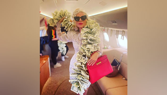 Lady Gaga mesmerises in boa made from $100 bills