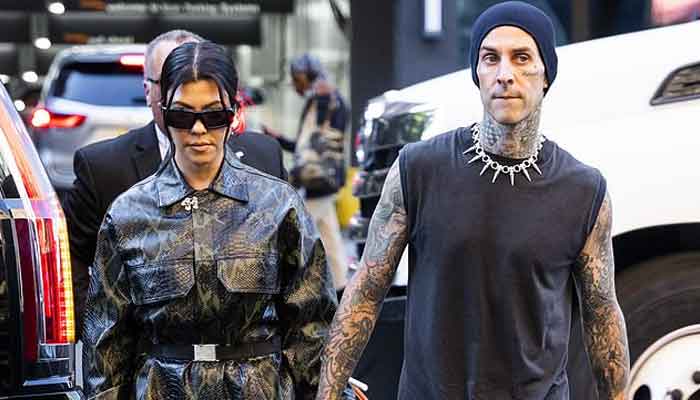 Kourtney Kardashian wows in snake print mini dress for outing with Travis Barker