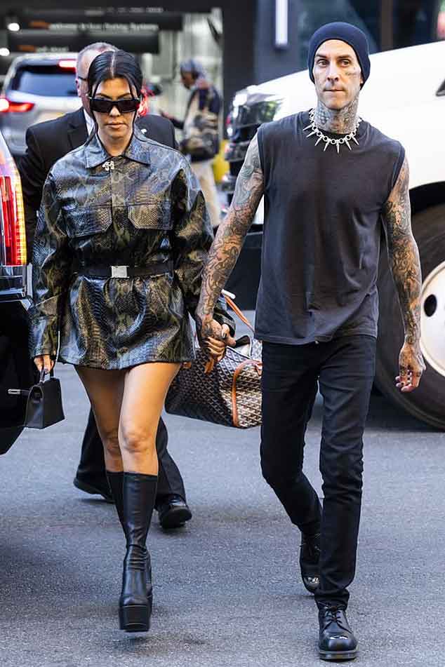 Kourtney Kardashian wows in snake print mini dress for outing with Travis Barker