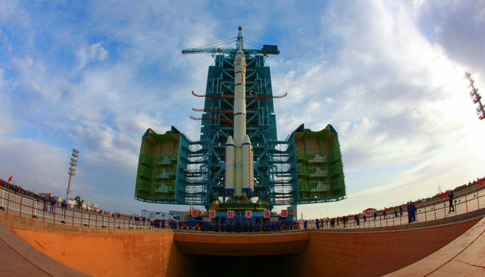 A Long March-2F carrier rocket, carrying the Shenzhou-13 spacecraft that was launched by China on October 16, 2021, was transported days earlier to the launching area at the Jiuquan Satellite Launch Centre in the northwestern Gansu province. AFP