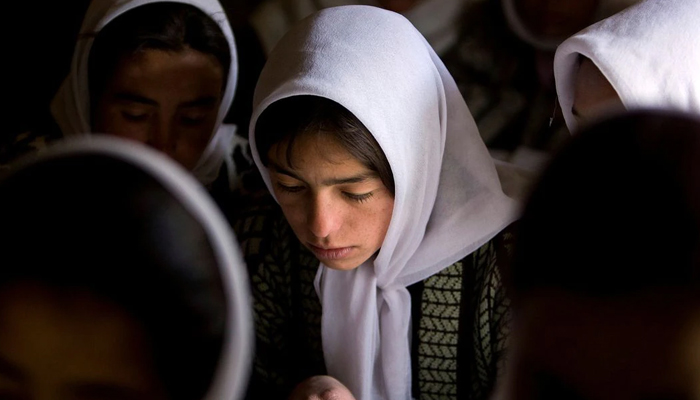 Afghan girls attend a class at the Ishkashim high school for girls in the northeastern province of Badakhshan, near the border with Tajikistan, Afghanistan April 23, 2008. — Reuters/File