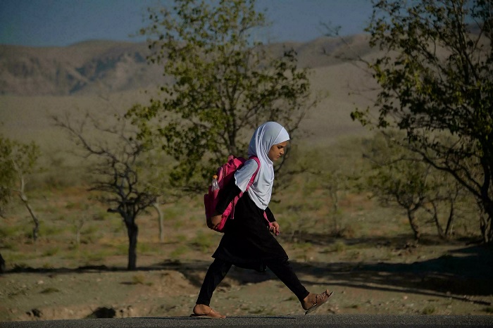 Primary schools have reopened for all children and women can go to private universities, though with tough restrictions on their clothes and movement. Photo: AFP