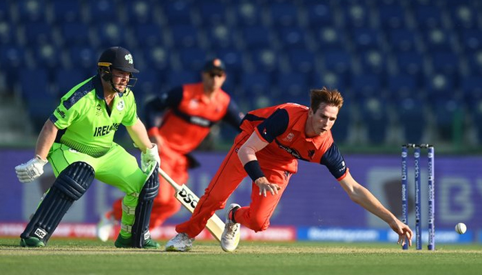 Ireland and Netherland players chasing in the warmup match on October 18. — Twitter/ICC