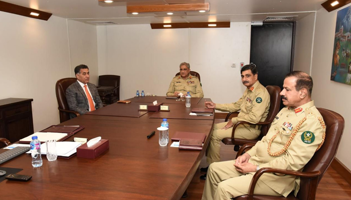Chief of Army Staff (COAS) General Qamar Javed Bajwa (centre) and Director-General ISI Lieutenant-General Faiz Hamid (left) at the ISI Headquarters on October 18, 2021. — ISPR