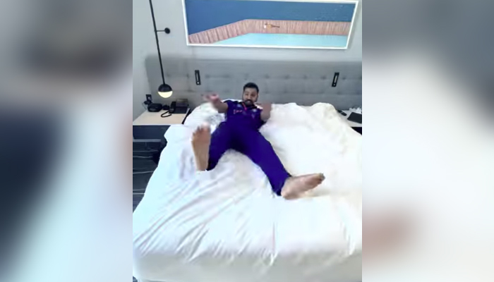 Indian batsman Rohit Sharma jumps on his bed. — Instagram