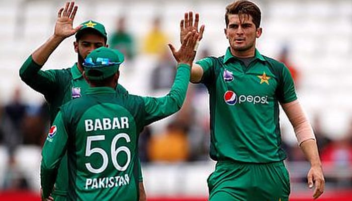 Babar Azam, Imad Wasim and Shaheen Afridi celebrate after a dismissal. Photo: Reuters