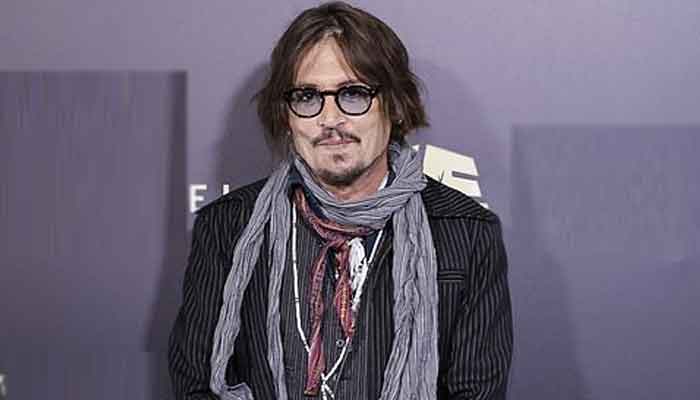 Johnny Depp looks dashing as he promotes his new TV series Puffins in Serbia