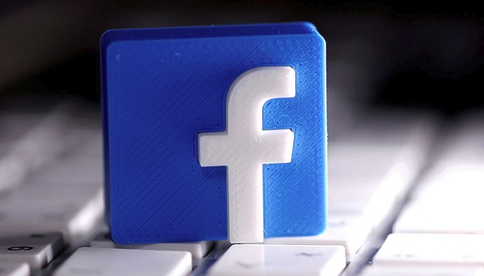 A 3D-printed Facebook logo is seen placed on a keyboard in this illustration taken March 25, 2020. Photo: Reuters