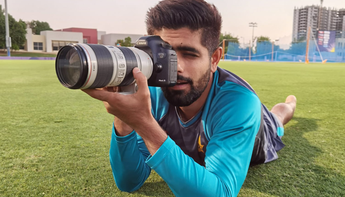 Pakistani skipper Babar Azam takes a photo. — Twitter/TheRealPCB