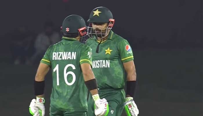 Pakistan captain Babar Azam and Mohammad Rizwan speak during the warm-up fixture against South Africa. Photo: ICC Facebook video screengrab
