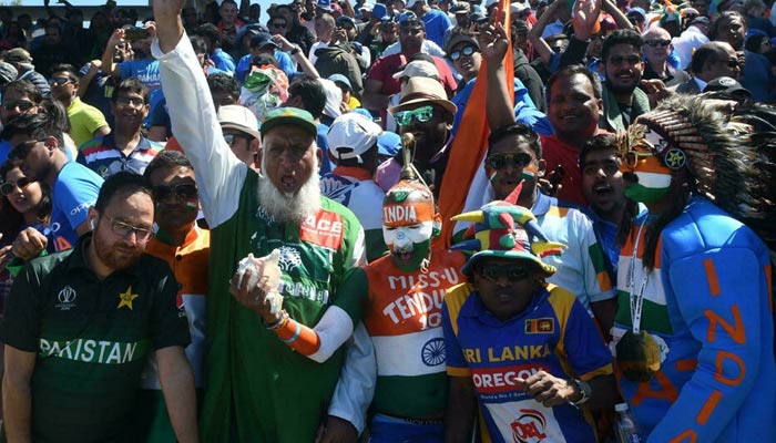 Pakistan and India fans mingle at the 2019 Cricket World Cup. — AFP/File
