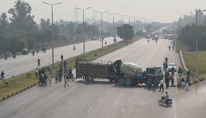 A large truck blocks off a road in Islamabad ahead of announced protests by a banned outfit. Photo: File